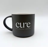CURE Believe Mug